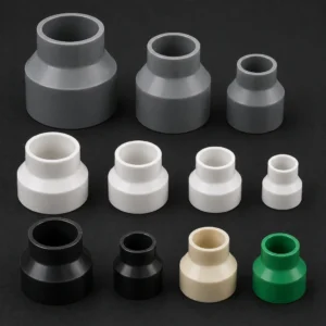 High-performance industrial reducers transitioning pipe sizes in a manufacturing facility.